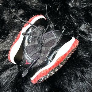 Black/Red toddler boy retro Jordan’s.